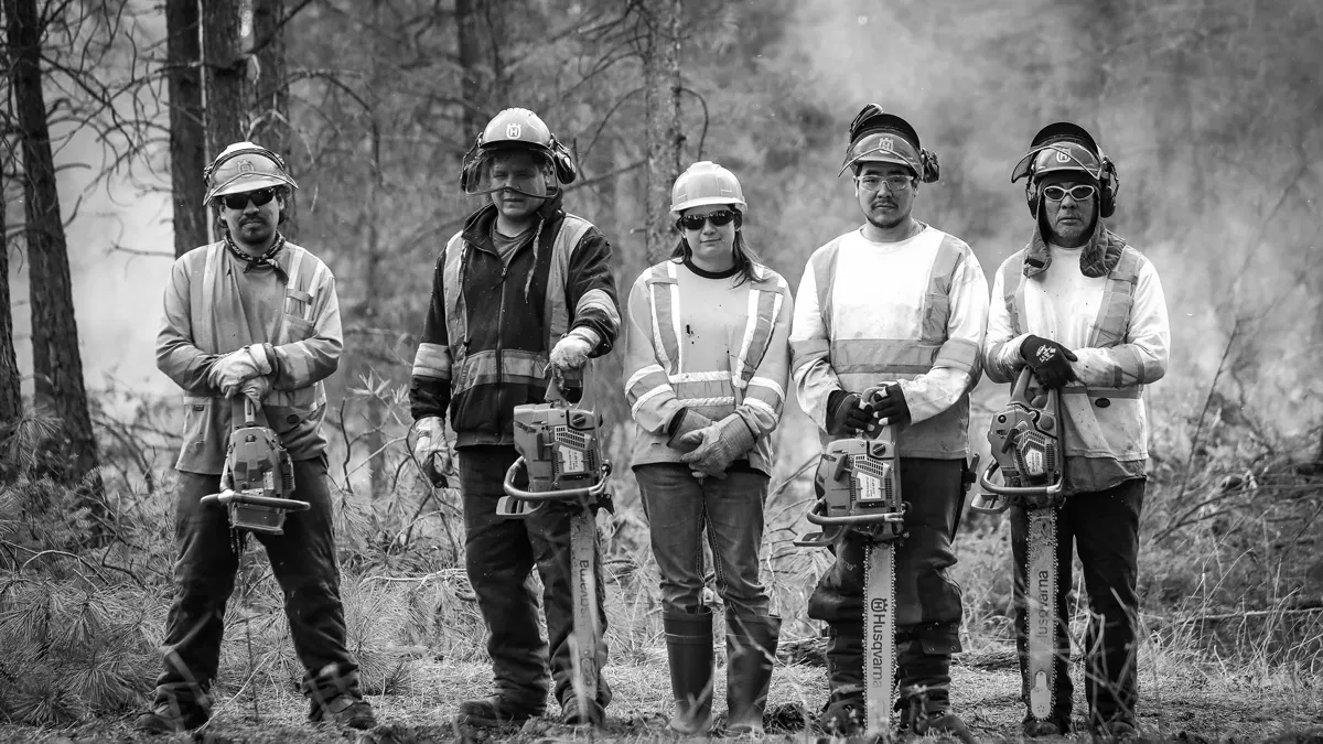 A Nupqu crew working together in the field